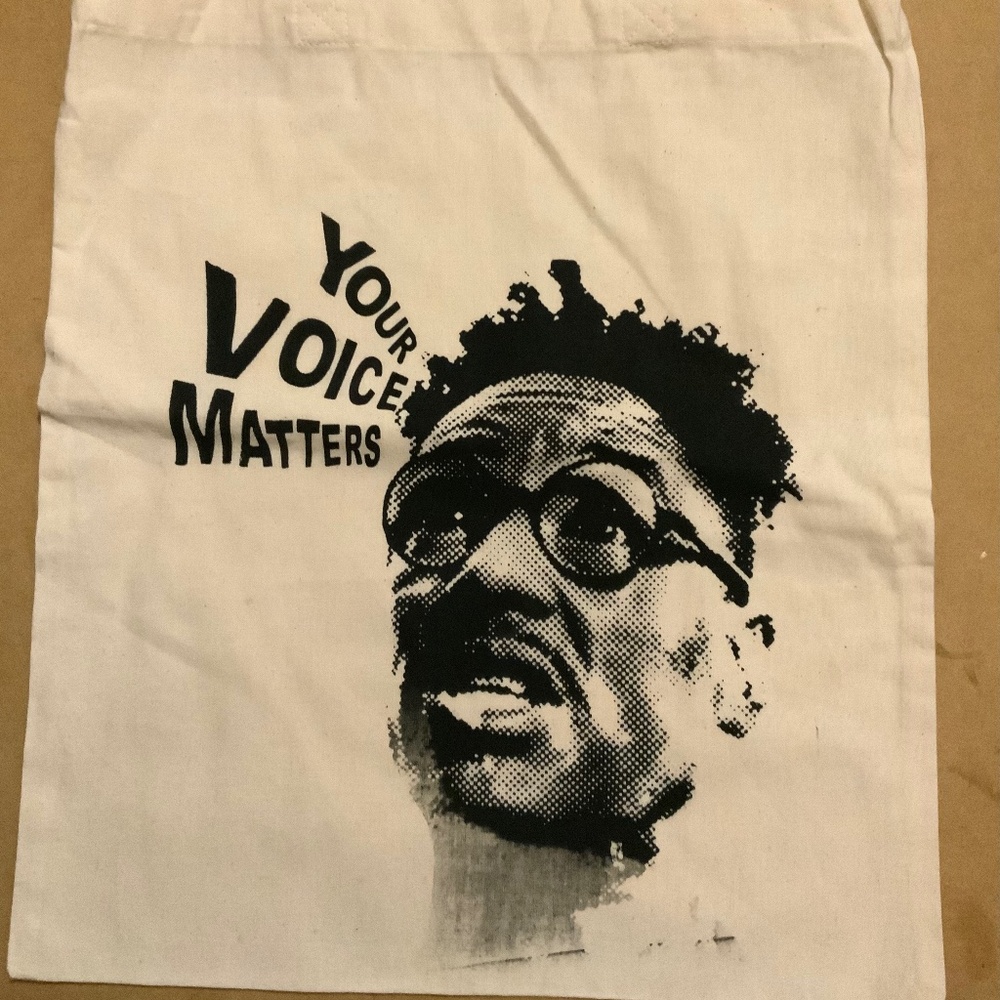 Your voice matters buggin out tan hand screen printed tote bag